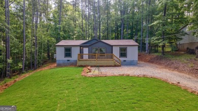 Lake Home For Sale in Eatonton, Georgia