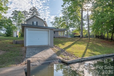 Situated along the shoreline of Badin Lake, this one-of-a-kind - photo 46