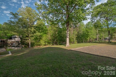 Situated along the shoreline of Badin Lake, this one-of-a-kind - photo 48