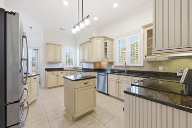 Custom built Mediterranean style home located in the gated - photo 10