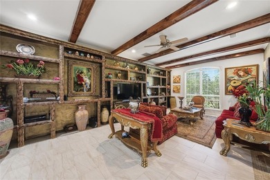 Experience refined country elegance on 4 manicured acres with