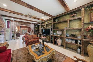 Experience refined country elegance on 4 manicured acres with