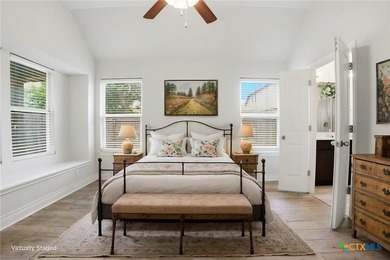 Welcome to this charming courtyard-style home in the highly - photo 1