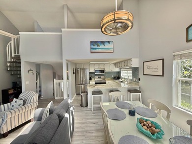 Updated townhome with new grey weathered-looking LVP flooring - photo 9