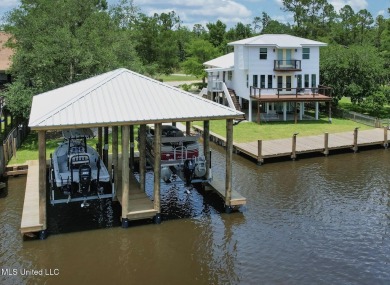 Lake Home For Sale in Kiln, Mississippi