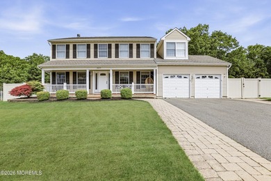Welcome home to this spacious and beautifully maintained Center - photo 1