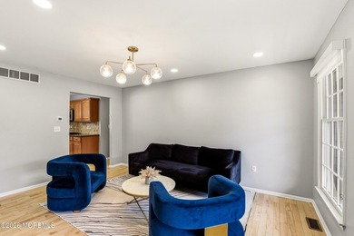Welcome home to this spacious and beautifully maintained Center - photo 6