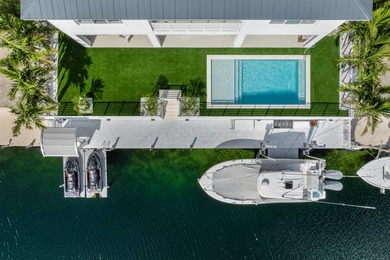 Experience elevated coastal living in this elegant Port Antigua - photo 1