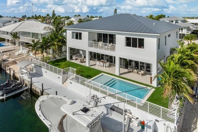 Experience elevated coastal living in this elegant Port Antigua - photo 2