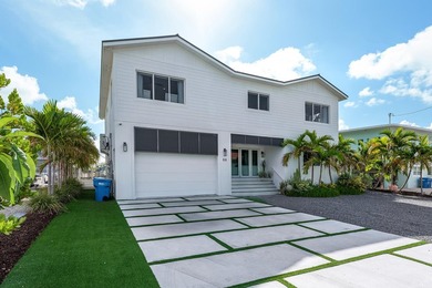 Experience elevated coastal living in this elegant Port Antigua - photo 3