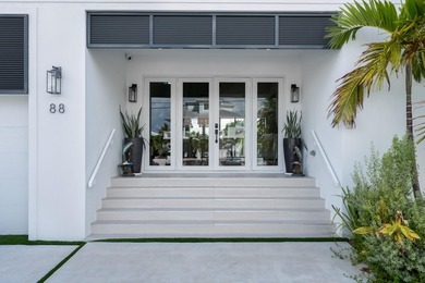 Experience elevated coastal living in this elegant Port Antigua - photo 4