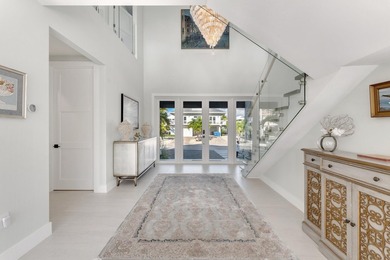 Experience elevated coastal living in this elegant Port Antigua - photo 5
