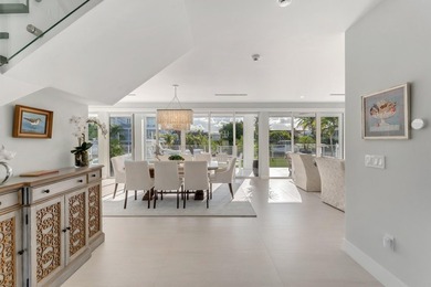 Experience elevated coastal living in this elegant Port Antigua - photo 6