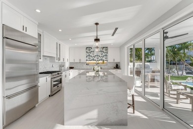 Experience elevated coastal living in this elegant Port Antigua - photo 9
