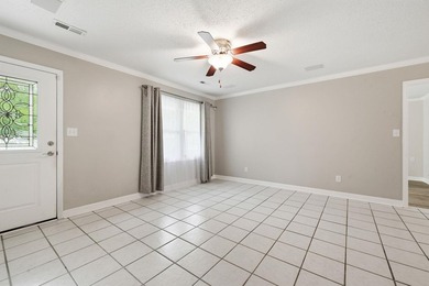 Welcome home to this beautifully updated 3-bedroom, 2-bath brick - photo 3