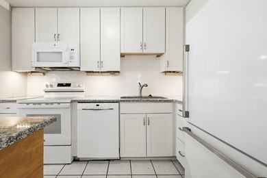 Welcome home to this beautifully updated 3-bedroom, 2-bath brick - photo 10