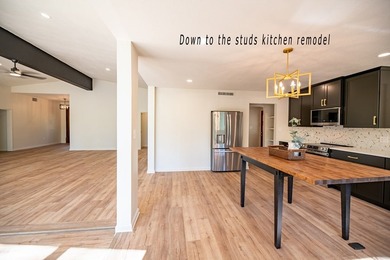 Discover this beautifully updated contemporary home, now - photo 10