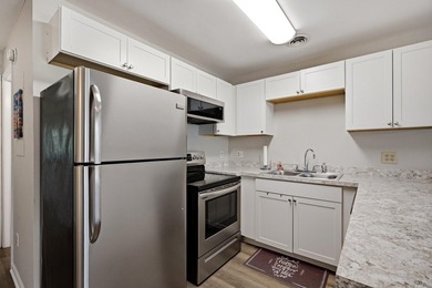 Enjoy comfortable coastal living in this bright and inviting - photo 8