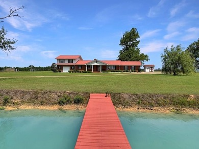 Known locally for the turquoise pond visible from the highway - photo 1