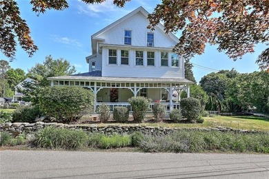 Nestled on a picturesque 3/4 acre lot in desirable Touisset - photo 1
