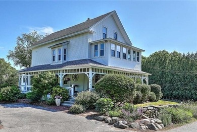 Nestled on a picturesque 3/4 acre lot in desirable Touisset - photo 4