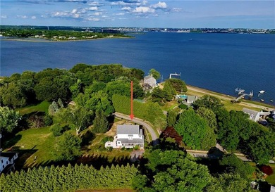 Nestled on a picturesque 3/4 acre lot in desirable Touisset - photo 5