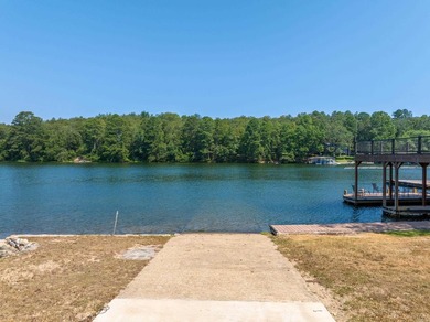 This exceptional lakefront property on the highly sought-after - photo 2