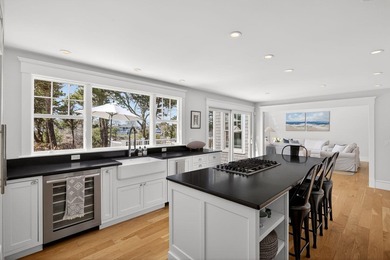 Experience refined coastal living in this fully renovated - photo 14
