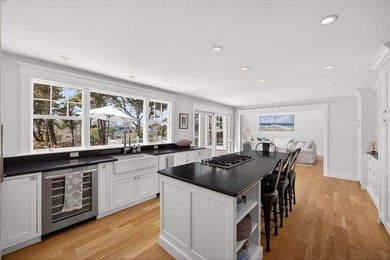 Experience refined coastal living in this fully renovated - photo 17