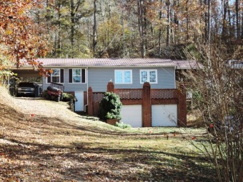 ONE LEVEL LAKE HOME!
 - Lake Home For Sale in Crane Hill, Alabama