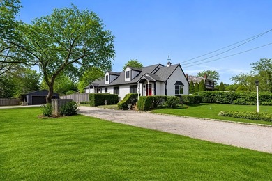 Set on a beautifully cleared, uniquely spacious 0.99-acre - photo 1