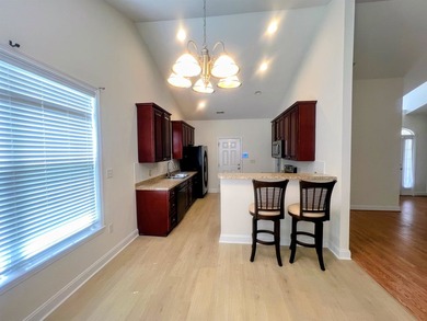 This home has a very inviting open floor plan and a breakfast - photo 4