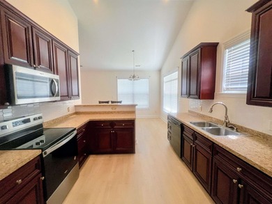 This home has a very inviting open floor plan and a breakfast - photo 5