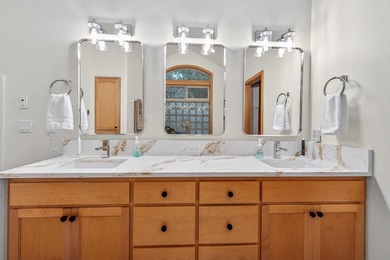 Step into luxury w/two beautifully remodeled bathrooms - photo 32