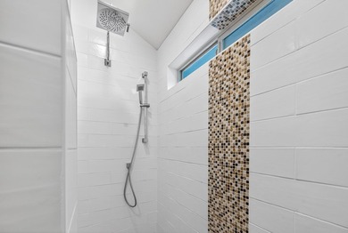 Step into luxury w/two beautifully remodeled bathrooms - photo 33