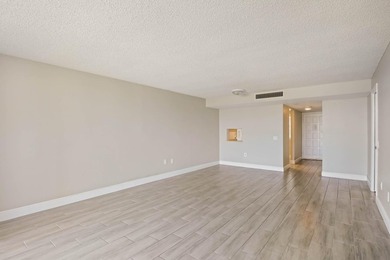 Beautiful 1-bedroom condo featuring updated flooring and a - photo 3