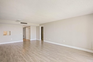 Beautiful 1-bedroom condo featuring updated flooring and a - photo 4