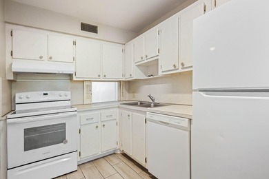 Beautiful 1-bedroom condo featuring updated flooring and a - photo 7