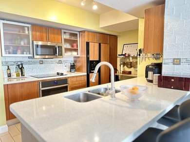 This 12th-floor unit in The Slade offers breathtaking views of - photo 2