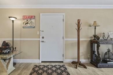 Experience easy coastal living in this beautifully updated - photo 3