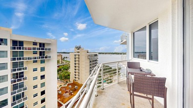 This 12th-floor unit in The Slade offers breathtaking views of - photo 3