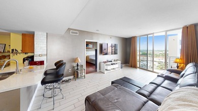 This 12th-floor unit in The Slade offers breathtaking views of - photo 6