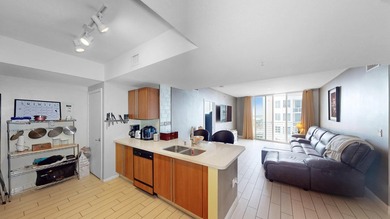 This 12th-floor unit in The Slade offers breathtaking views of - photo 8