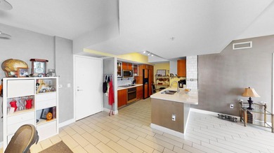 This 12th-floor unit in The Slade offers breathtaking views of - photo 9