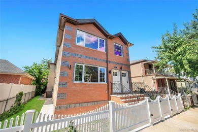 Introducing a stunning 2026-built legal Two-family home located - photo 3