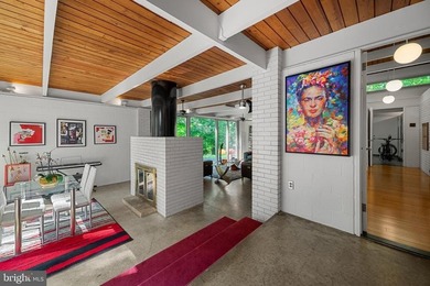 Some homes are built. This one was conceived.Designed in 1961 by - photo 7