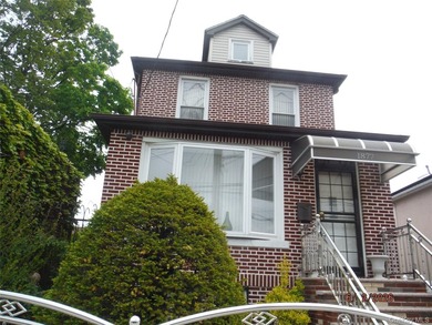 Occupied detached Colonial in the Flatlands section of Brooklyn - photo 2