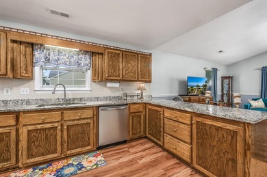 NO HOA, a fenced backyard overlooking the pond, and an updated - photo 3