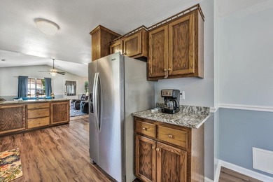 NO HOA, a fenced backyard overlooking the pond, and an updated - photo 4