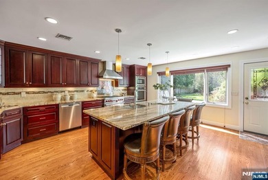 Set on a private and beautifully landscaped .8-acre property - photo 9